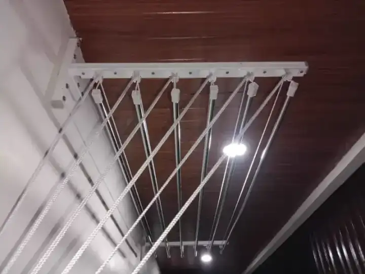 Ceiling mounted cloth hanger with pulley system installed in Chennai home
