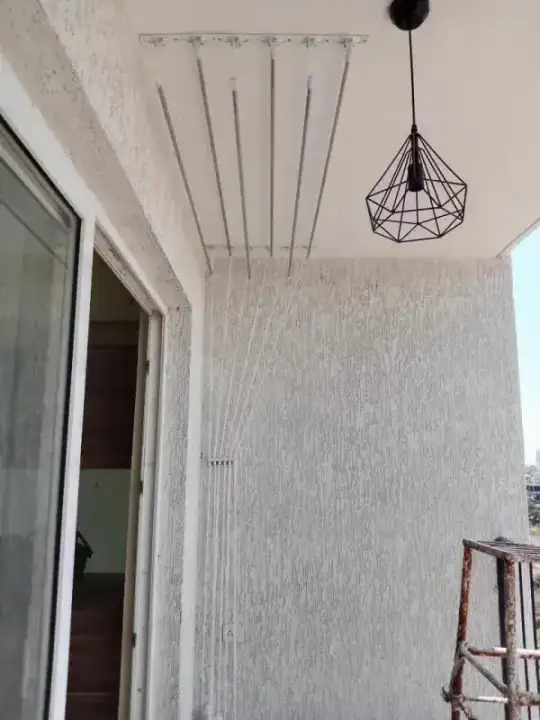 Balcony ceiling cloth hanger installation with rope pulley in Chennai apartment
