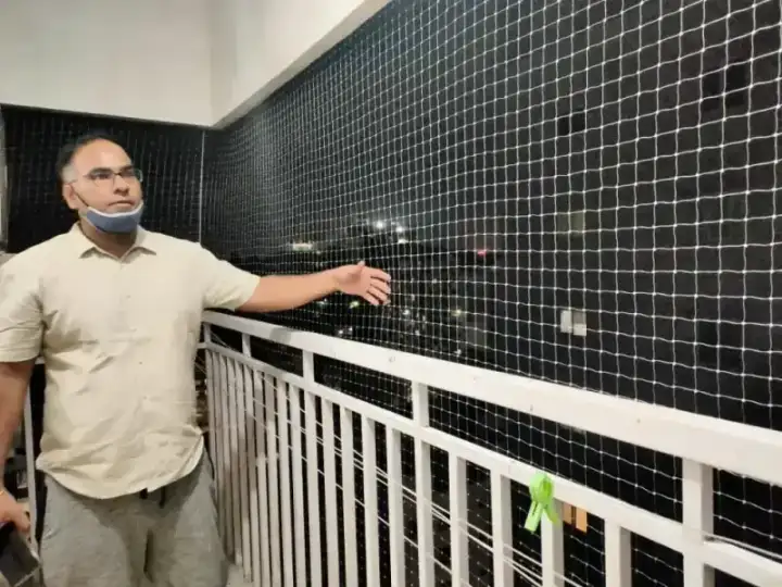 Professional pigeon net installation on residential balcony in Chennai